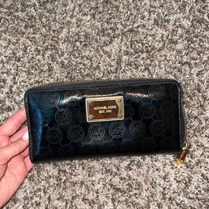 Black and gold MK wallet